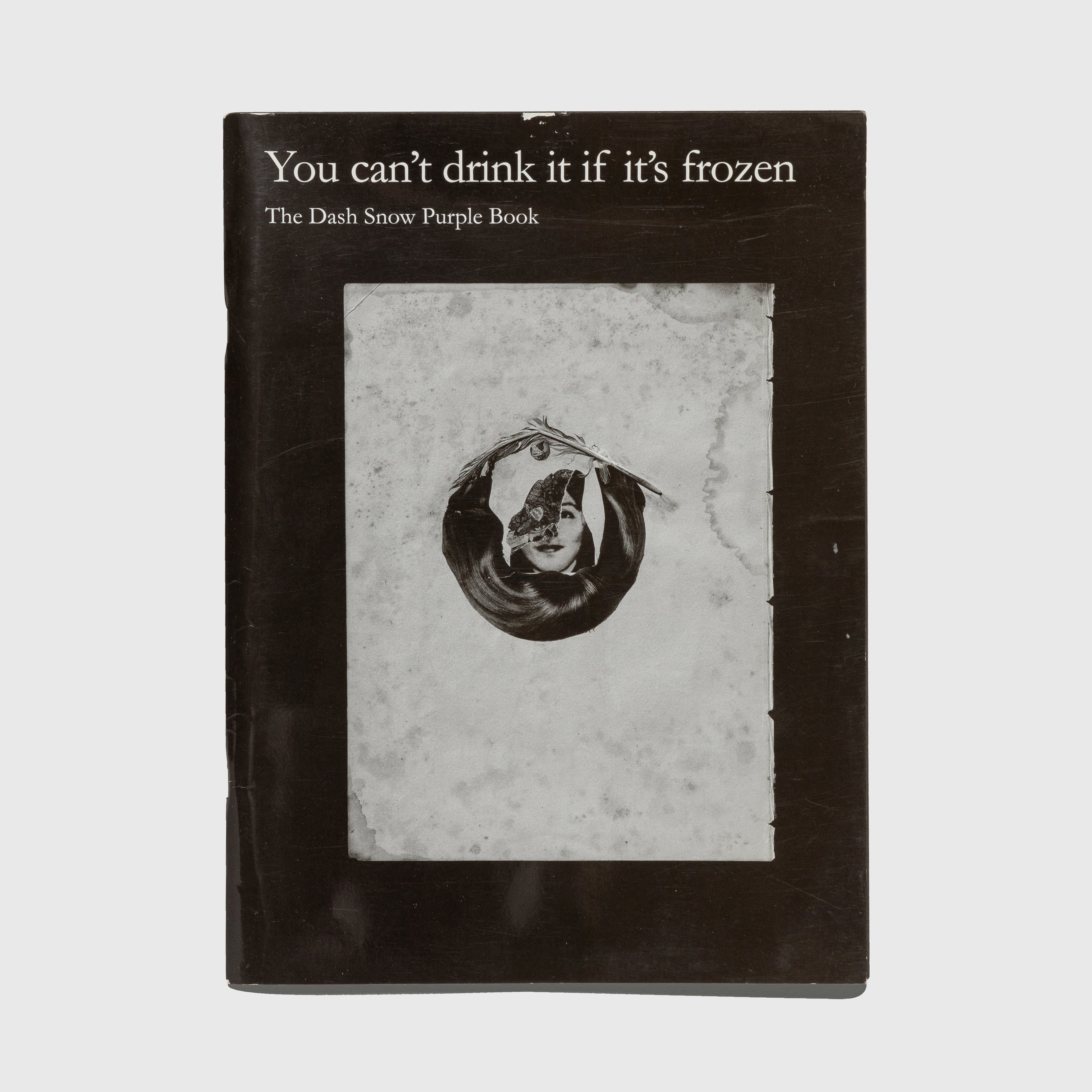 Book titled 'You can't drink it if it's frozen' with a black and white illustration on the cover. 