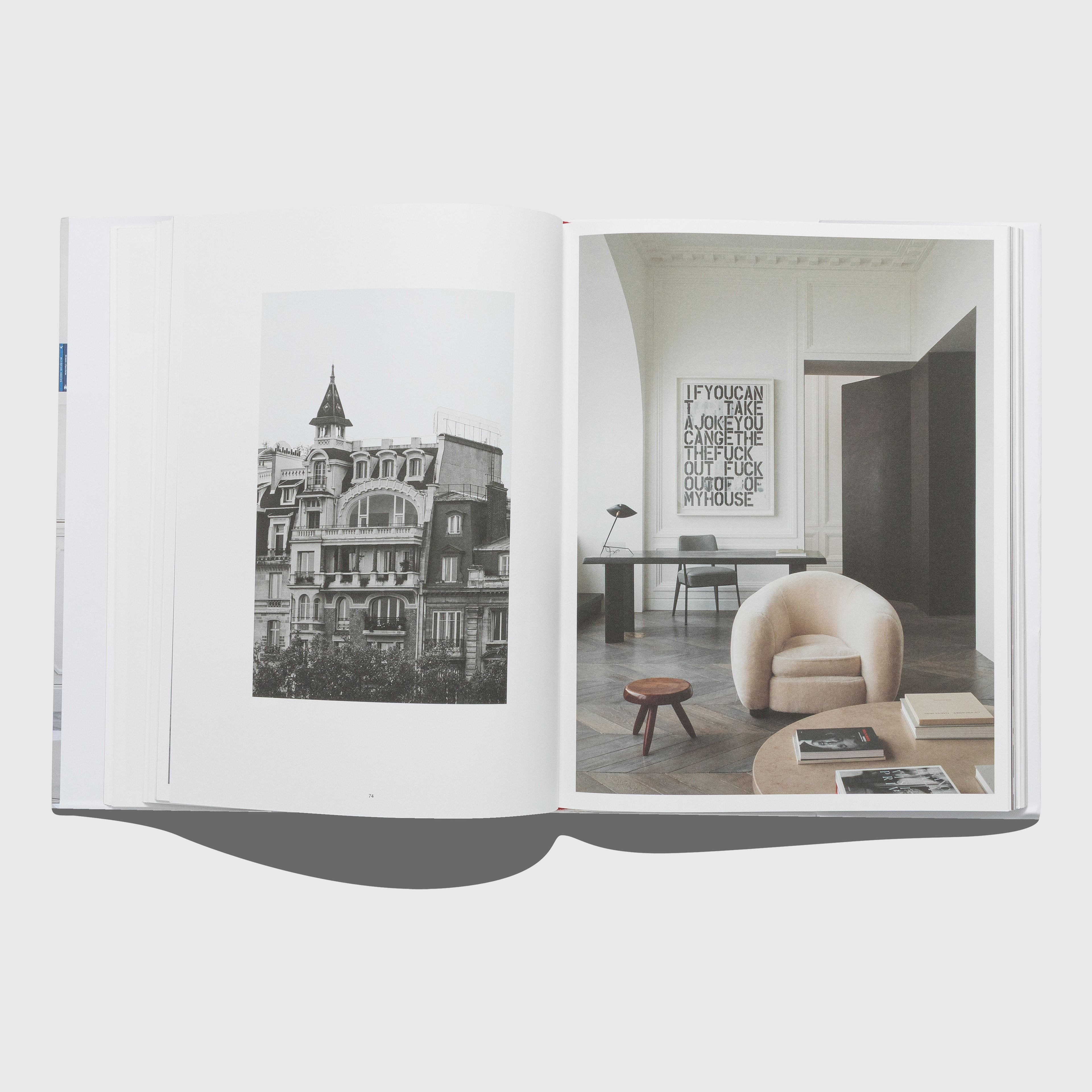 Open book showing a black and white photo of a building and a color photo of a modern interior. Christopher Wool artwork. Interior by Joseph Dirand. Published by Rizzoli.