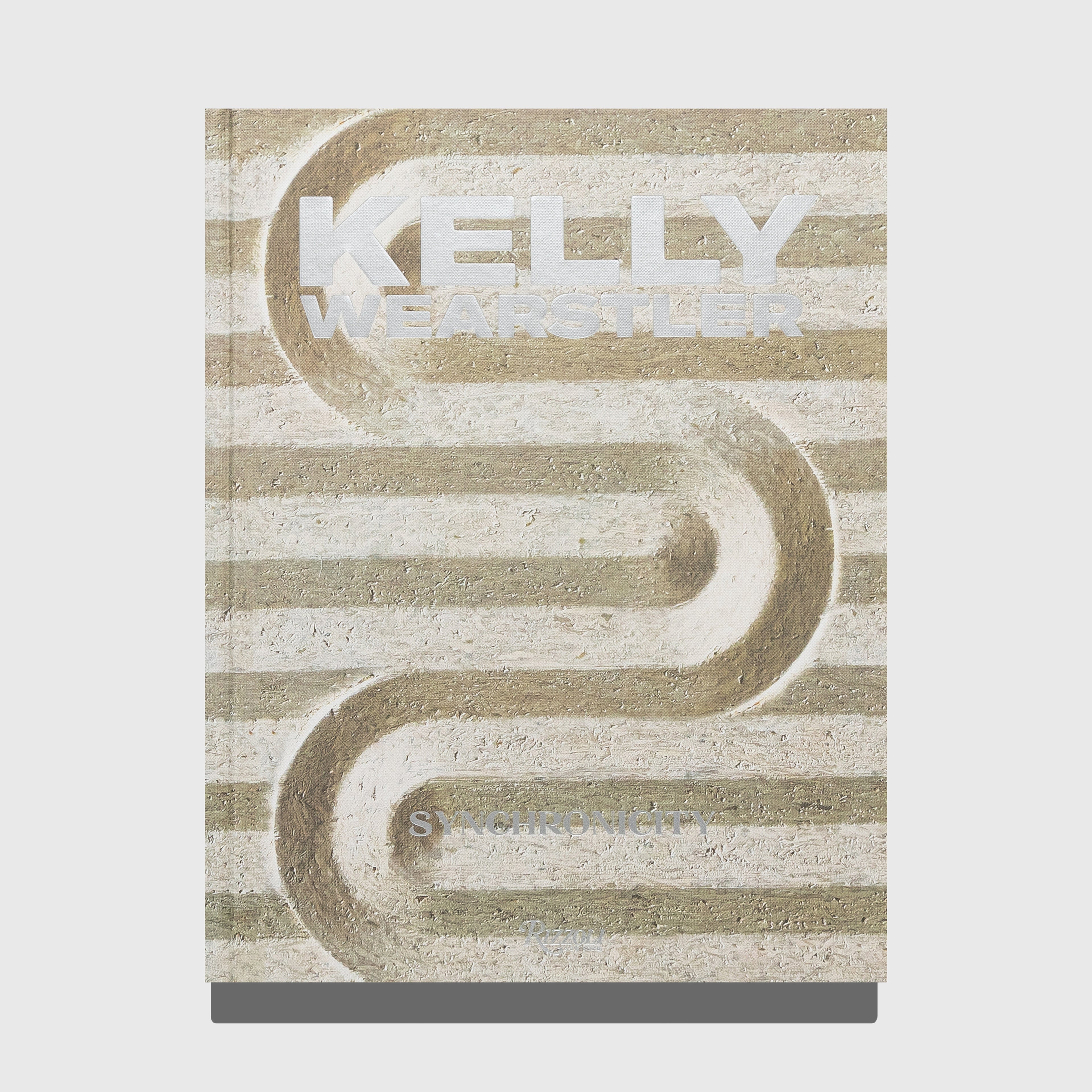 Synchronicity by Kelly Wearstler. Published by Rizzoli. Book on a grey background.