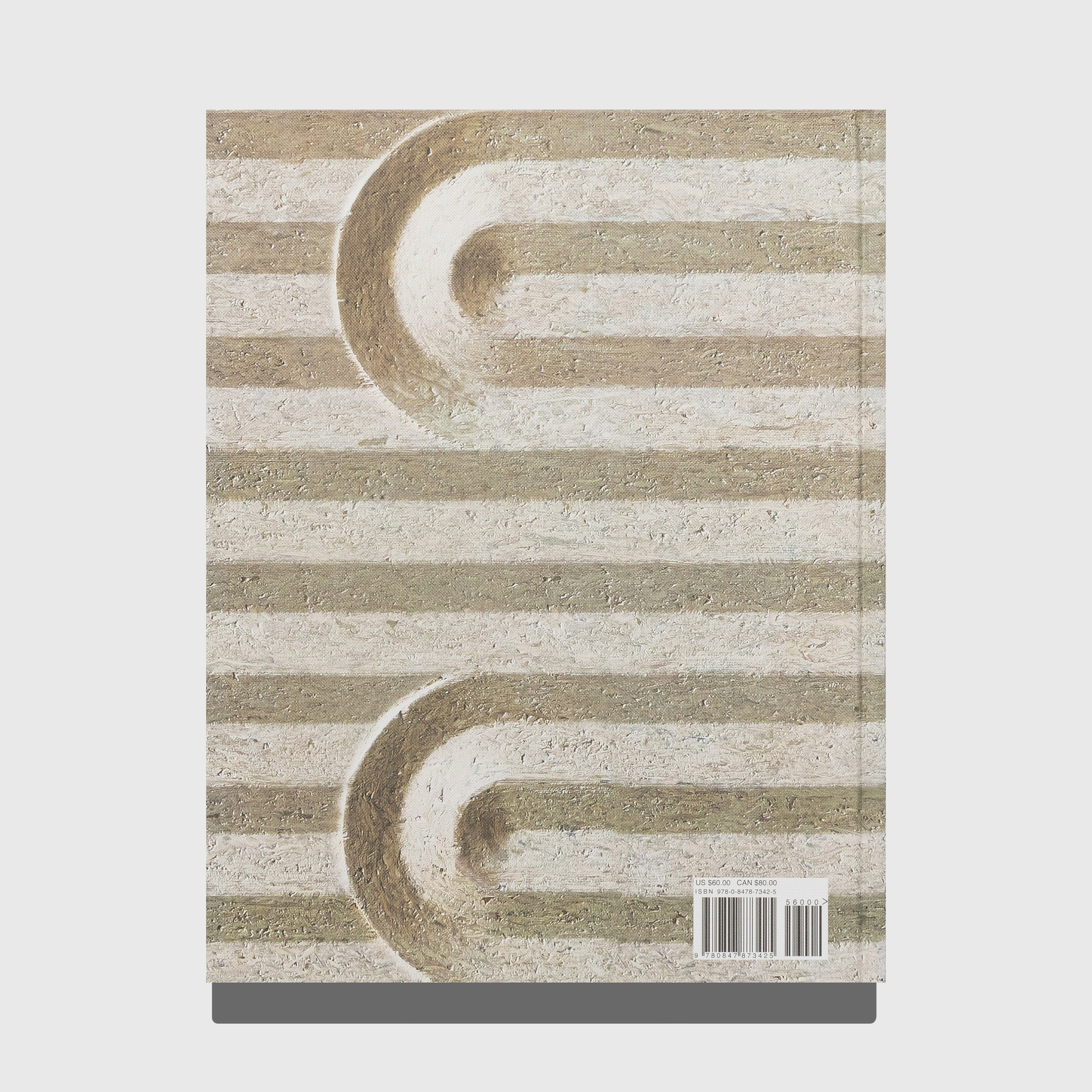 Book with a geometric pattern on the cover. Synchronicity by Kelly Wearstler. Published by Rizzoli.