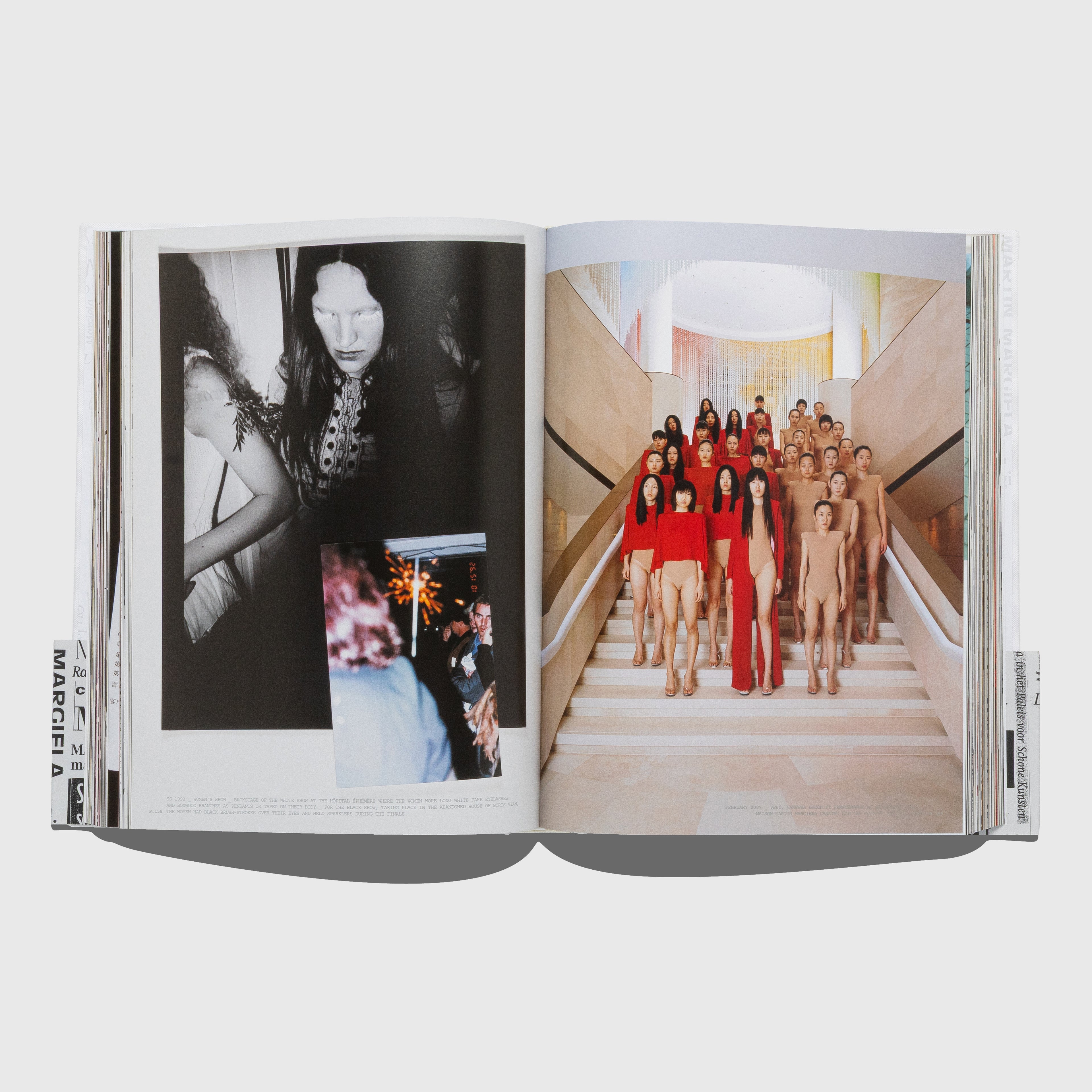 Open book showing a black and white photo on the left and a color photo of people on a staircase on the right. Vanessa Beecroft. Maison Martin Margiela book published by Rizzoli.