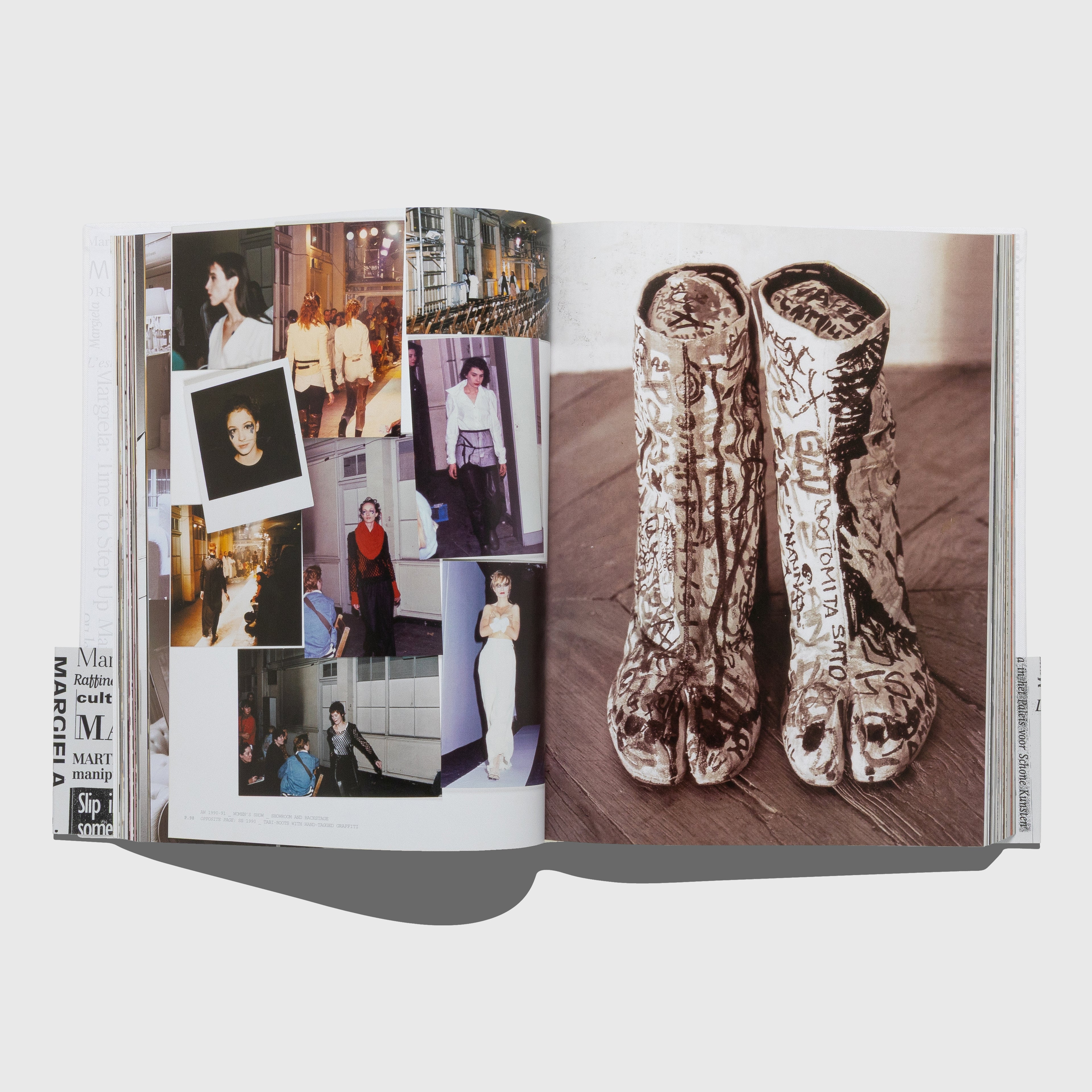Open book showing a collage of people and a pair of Margiela tabi graffiti artisan boots on a wooden floor.  Maison Martin Margiela book published by Rizzoli.
