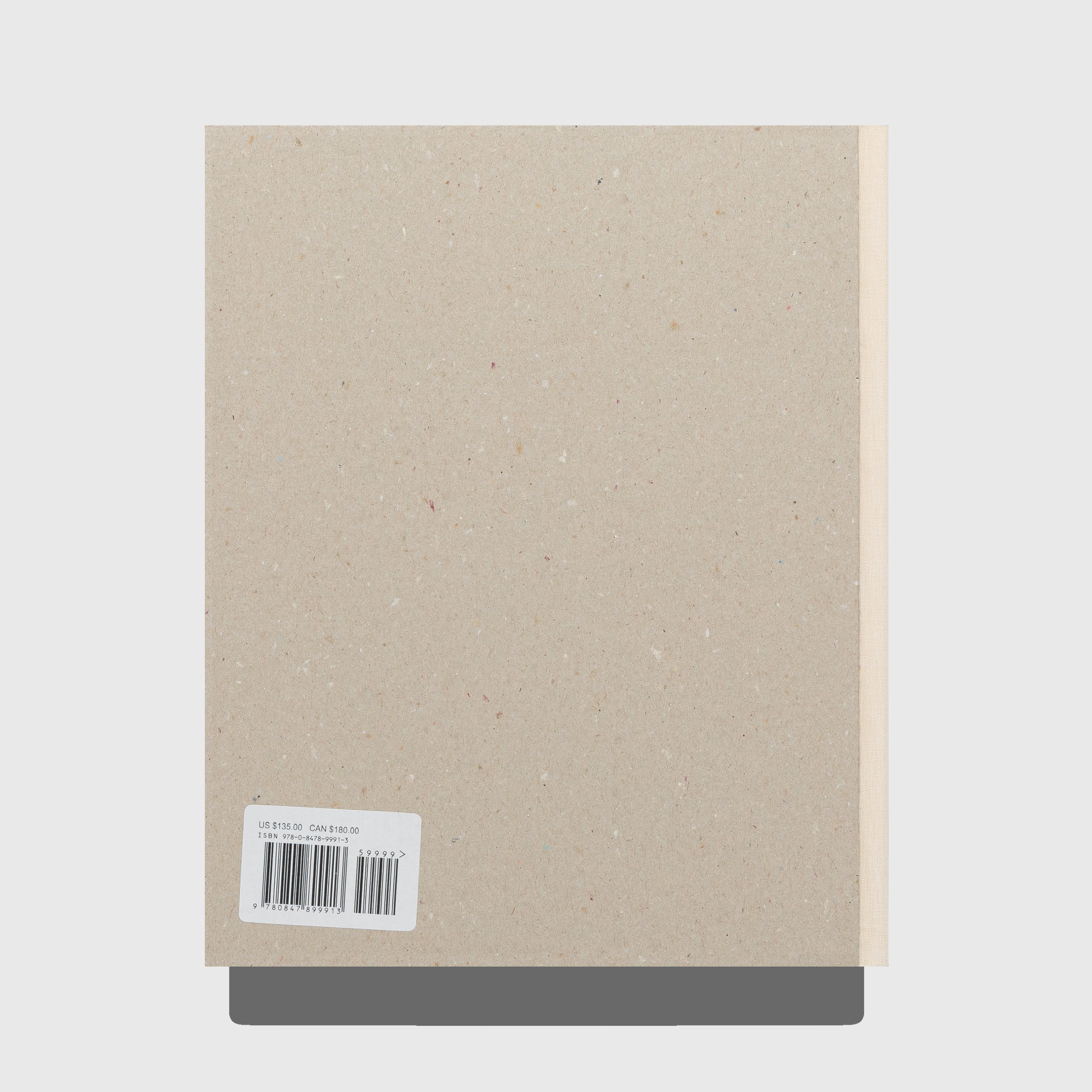 Beige textured notebook with a barcode label on a light gray background. Out of Date book by Mark Borthwick. Published by Rizzoli.