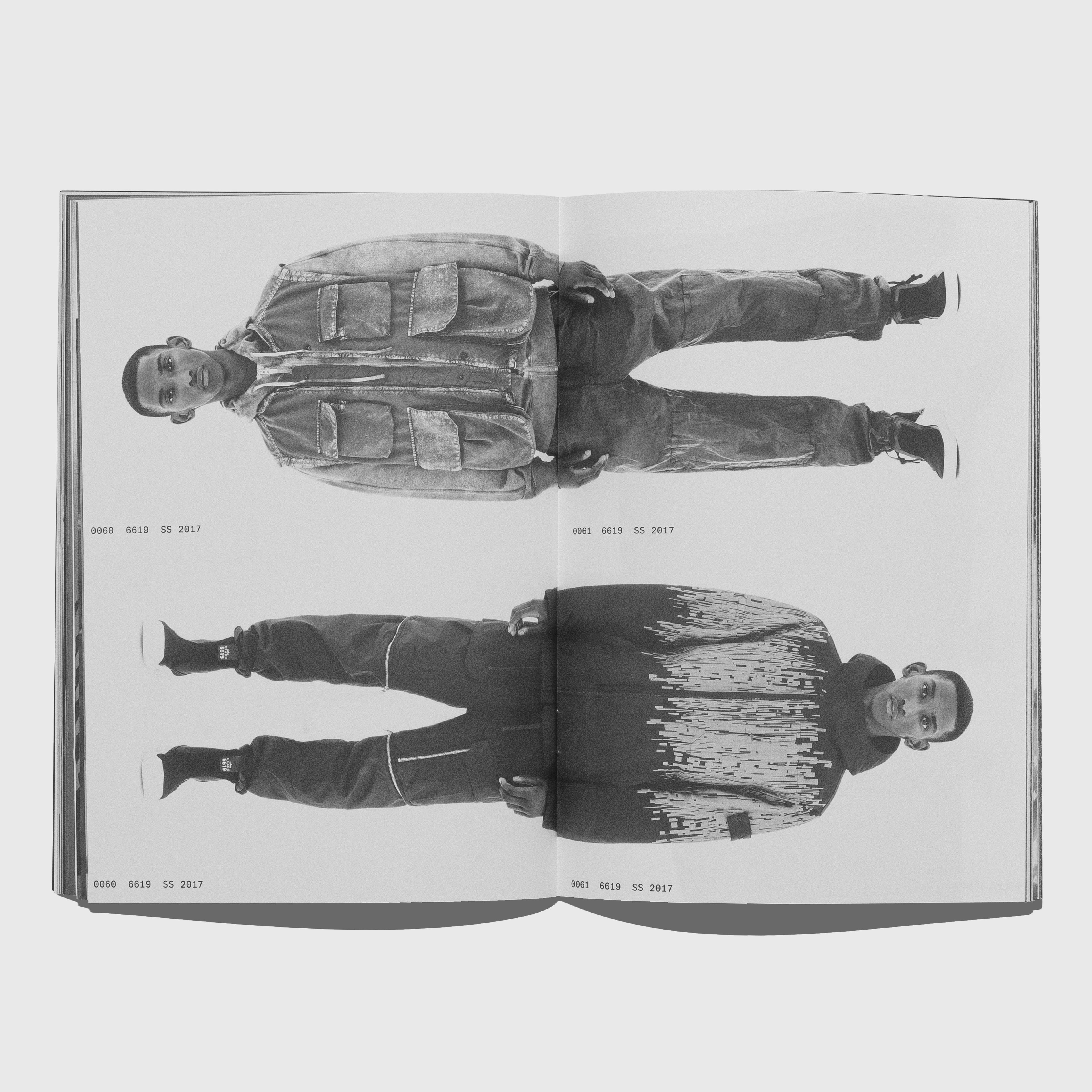Open book showing black and white images of a person in different outfits. Stone Island Shadow Project 2008-2020 by ACRONYM GMBH.